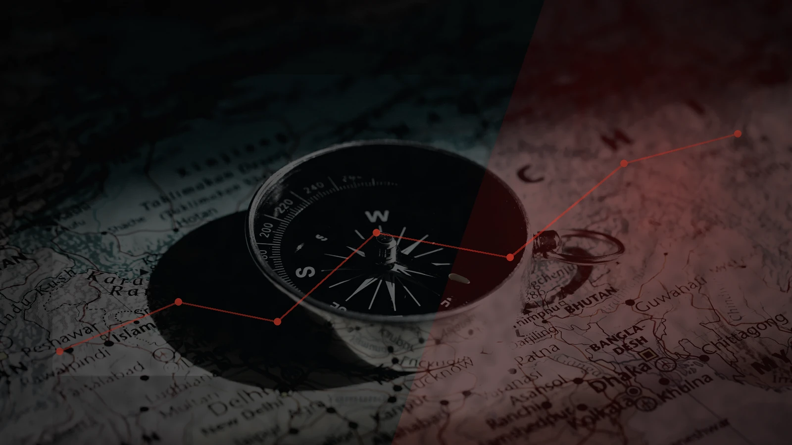 Compass resting on a paper map, illustrating offline navigation when mobile maps and data connections are unavailable