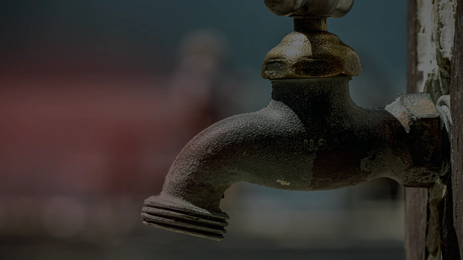 A weathered dry tap symbolising the loss of normal mains water supply